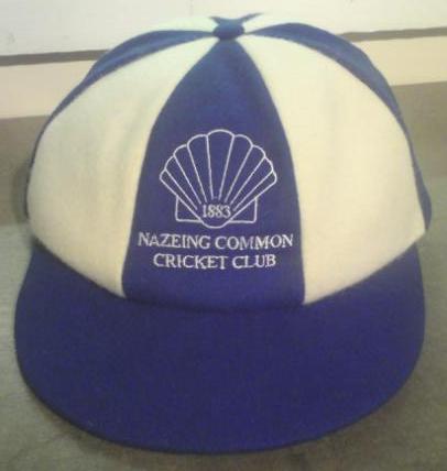 Martin Berrill Sports’ Custom, Honour & Commemorative Caps—blue and white with a shell emblem and "1883 Nazeing Common Cricket Club" embroidered—make perfect honour caps to celebrate your team’s legacy.