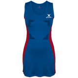 The Gilbert Eclipse Netball Dress is a sleeveless women's uniform in royal with red side panels, featuring a white Gilbert logo on the left chest, fitted shape, and scoop neckline for comfort and style.
