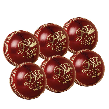 The Dukes Cadet Junior Red 6 Pack includes six junior cricket balls with gold lettering and white stitching, displayed in two rows against a white background—ideal match balls for young players.