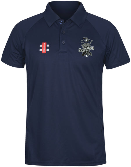 The Gray Nicolls Eastcombe CC Matrix V2 Polo Shirt in navy features short sleeves, collar, button placket, red-and-white left chest logo, EASTCOMBEE crest right chest logo, and moisture-wicking fabric—perfect for active training.