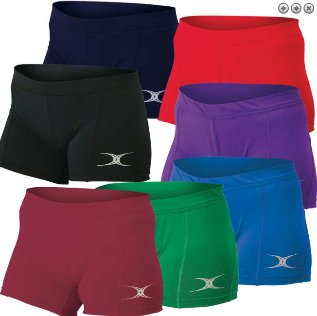 Six pairs of Gilbert Eclipse II Netball Shorts by Gilbert, in assorted colors, feature a white front left logo, elastic waistband, and stretch fabric for comfortable movement—ideal for active play.