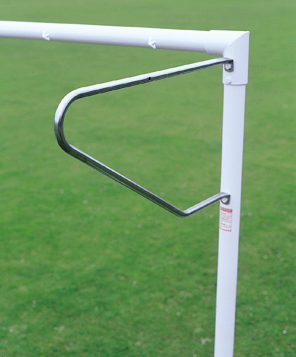A close-up of Harrod Sport’s Continental Tubular Steel Net Supports—Senior/Junior, crafted from durable zinc plated steel and featuring a triangular corner flag holder, standing on a grassy field.