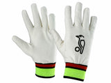 A pair of Kookaburra Full Chamois Inner Gloves for adults, white with black bird logos and cuffs striped in green, red, and black, are shown laid flat with palms down.