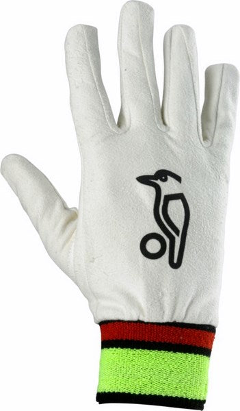 The Kookaburra Full Chamois Inner Gloves, by Kookaburra, offer white cricket gloves with a black bird logo and a red, black, and neon yellow wristband—perfect for adults or as an outer layer over chamois inners.