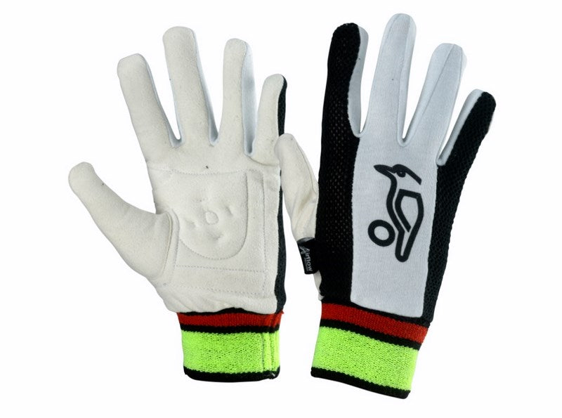 Kookaburra Padded Chamois Inner Gloves by Kookaburra feature memory foam palms, white fronts, black backs, neon yellow cuffs with red and black stripes, and a Kookaburra logo on one glove.