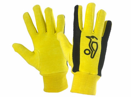 Kookaburra Plain Cotton Inner Gloves by Kookaburra: yellow gloves with black textured grips and a black penguin logo, shown on a white background—perfect as wicket keeping gloves or as comfortable cotton inners.