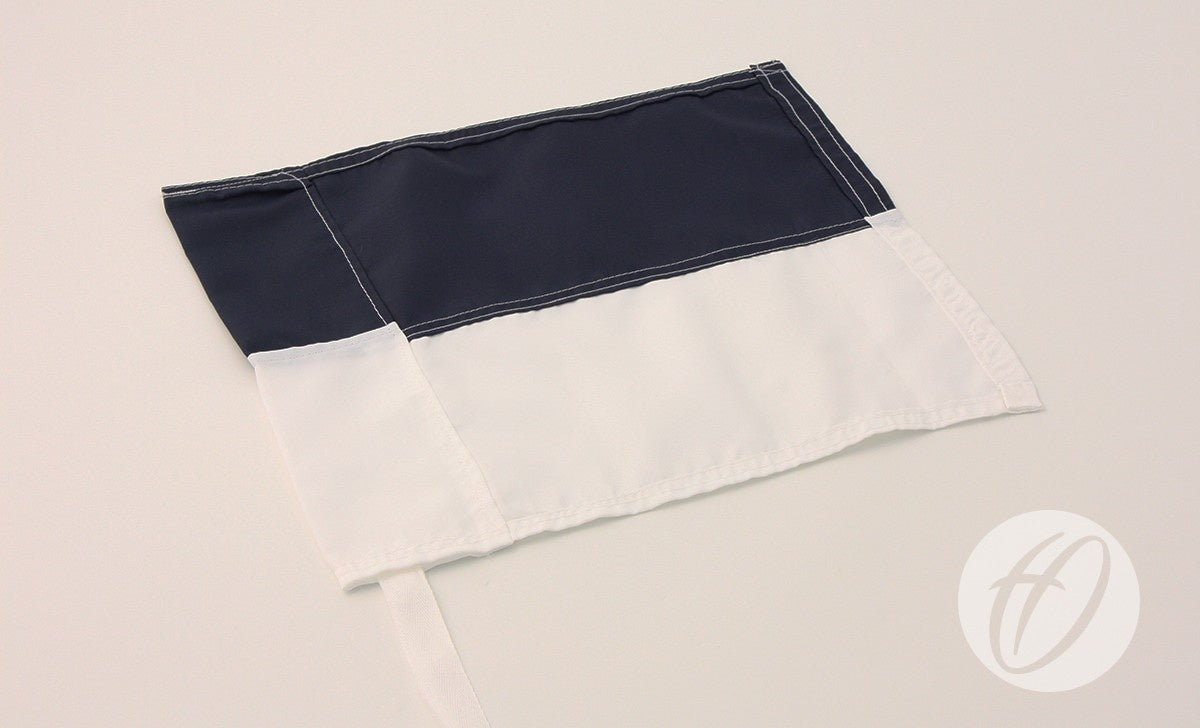 The Harrod Sport Navy Blue & White Horizontal Flag (30cm x 30cm) has a dark blue upper half, white lower half, stitched seam, white hoist edge, and flexible PVC corner poles. The flag is shown flat on a light surface.