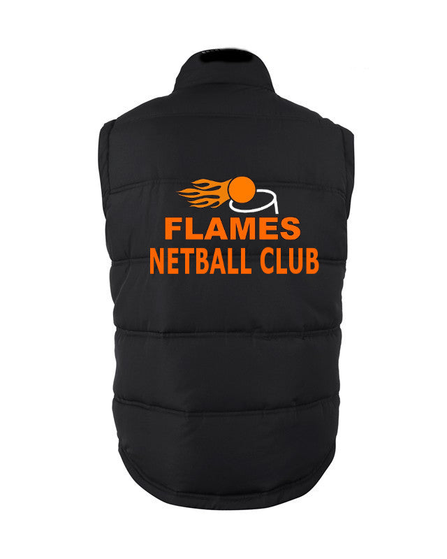 The Martin Berrill Sports Flames Netball Club Gilet is shown from the back with wind-resistant black fabric, an orange logo, "FLAMES NETBALL CLUB" text, and a stylized flaming netball above the lettering.