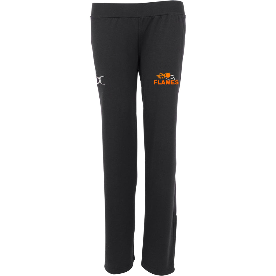 The Flames Netball Club Gilbert Womens Vixen Pant by Gilbert features a small silver logo on the right hip, an orange FLAMES Netball Club logo with flame graphic on the left, a straight-leg fit, and an elastic waistband for comfort.