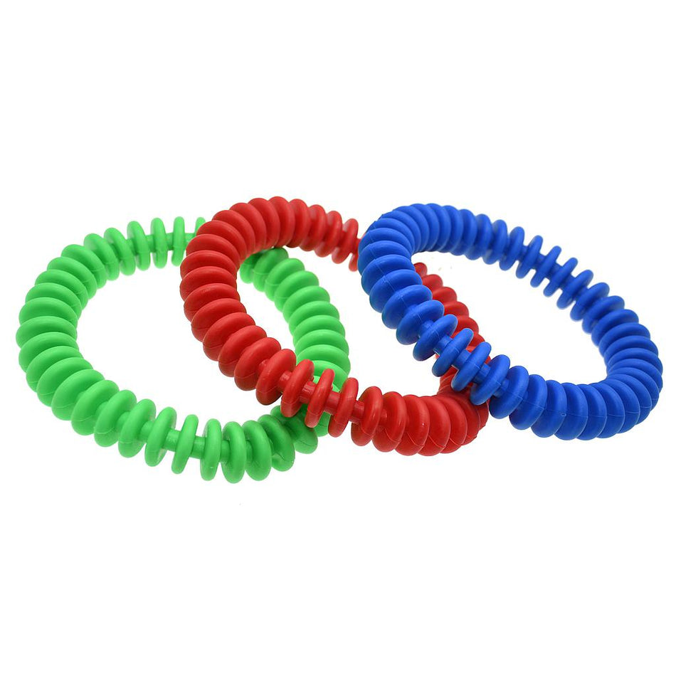 The Reydon Sports Flexi Throwing Ring set features three interlocking, ribbed rings in green, red, and blue. Made from flexible, durable material, they're ideal for throwing and catching. Displayed on a white background.