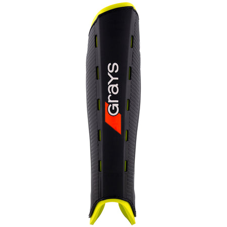The Grays G600 Hockey Shinguard features a black/yellow design, red and white central logo, vertical ventilation slits, curved ergonomic fit, and a lightweight polymer shell for impact protection.