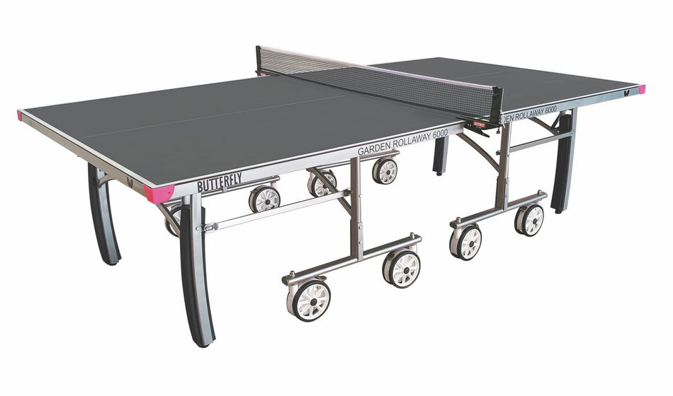 The Butterfly Garden Rollaway 6000 Outdoor Table Tennis Table (Grey) features a 6mm melamine top, net, foldable legs, and four large wheels per half for easy transport. The Butterfly logo is visible on the side.