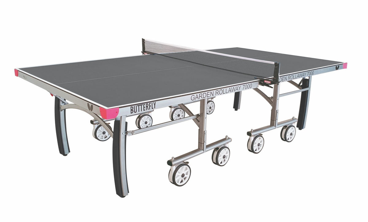 The Butterfly Garden Rollaway 7000 Outdoor Table Tennis Table (Grey) features a sturdy metal frame, 7mm melamine top, foldable design with wheels for easy storage, and attached net—ideal for outdoor use.