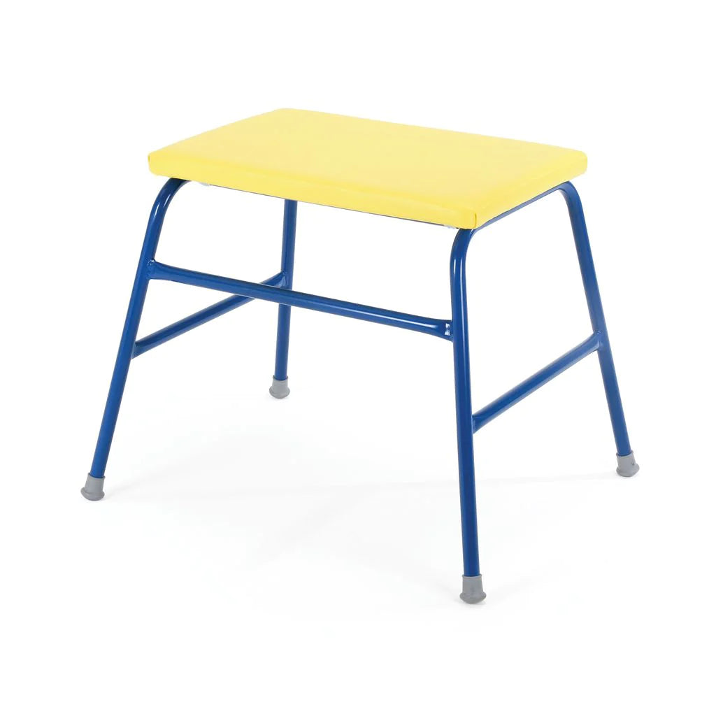 The Niels Larsen Agility Table by Niels Larsen features a yellow vinyl padded seat and blue metal legs with gray rubber caps. Shown on a white background, this table offers practical linking options for various settings.