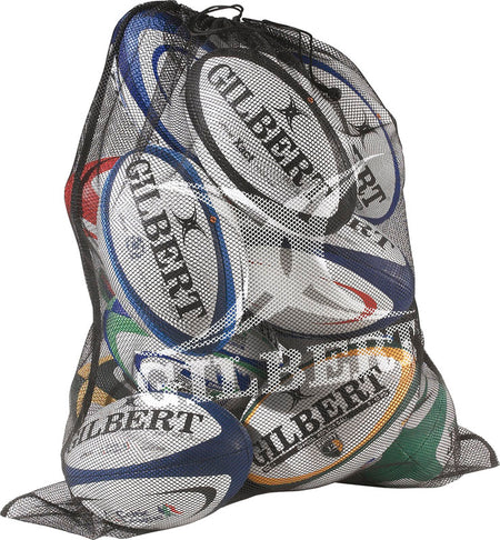 The Gilbert Fine Mesh Ball Bag, featuring lightweight mesh material, holds several colorful Gilbert rugby balls with the brand name visible through the netting.