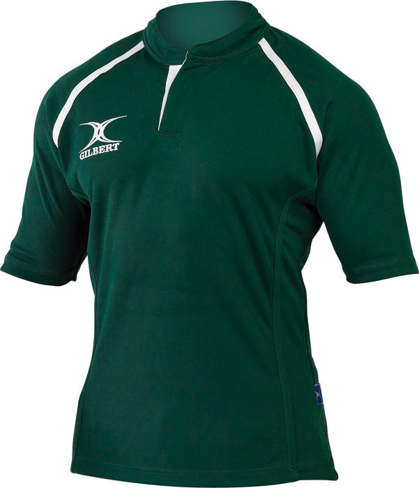 The Gilbert Xact Match Monochrome Rugby Shirt by Gilbert features a green color, white shoulder accents, and a white Gilbert logo on the left chest, ideal for durable sportswear.