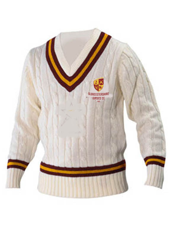 The Gloucestershire Gipsies Cricket Sweater by Martin Berrill Sports is a cream cable-knit with maroon and gold stripes on the V-neck, cuffs, and hem, plus an embroidered club logo on the left chest.