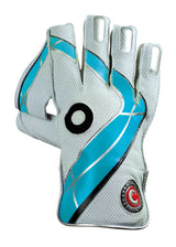 The Hunts County Calidus Wicket Keeping Glove by Hunts County is white with blue and black accents, features a perforated texture, Pittards leather for grip, and a circular black-and-white logo near the wrist, shown on a white background.