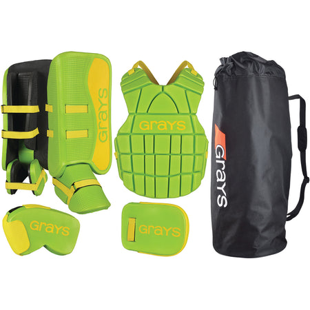 The Grays G90 Junior Goalie Set features lime/yellow leg guards, chest protector, gloves, and a black Grays bag—all shown on a white background. Perfect for young goalies.