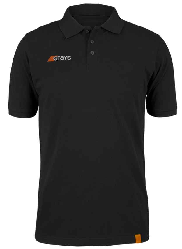 The Grays Junior Tangent Polo Shirt is a black short-sleeve polo in soft pique fabric, featuring a collar, three buttons, white and orange Grays logo on the left chest, orange tag at the hem—ideal for a casual look.