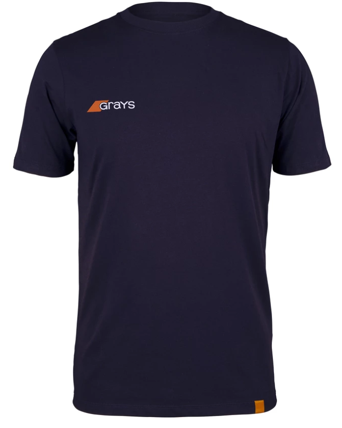 The Grays Junior Tangent Tee Shirt by Grays features a dark navy blue casual fit with "Grays" and an orange geometric design on the chest, a small orange tag near the hem, and is made from soft organic cotton for everyday comfort.