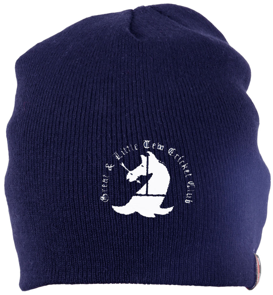 The Great Tew CC Beanie Hat by Gray Nicolls is navy blue with a white embroidered unicorn and boat club logo, plus “Great Tew CC” in a circular design around the emblem.