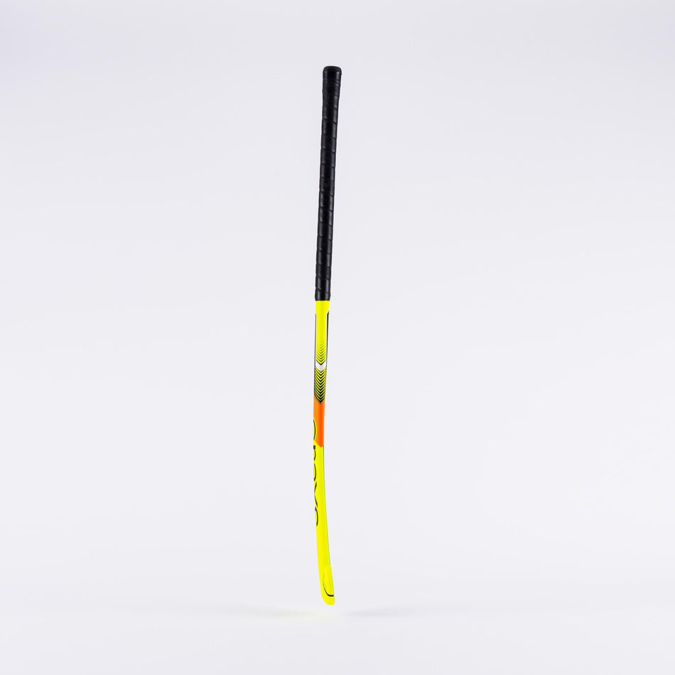 The Grays GK6000 Pro Goalie Hockey Stick by Grays stands upright against a white background, featuring a lightweight yellow and black design, a slightly curved blade, black grip tape handle, and reinforced mid-section for extra durability.