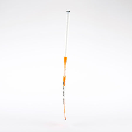 The Grays 850i Probow Indoor Wooden Hockey Stick by Grays stands vertically against a plain white background, its clean lines evoking the sleek design of a fencing sword with a white grip and orange guard.