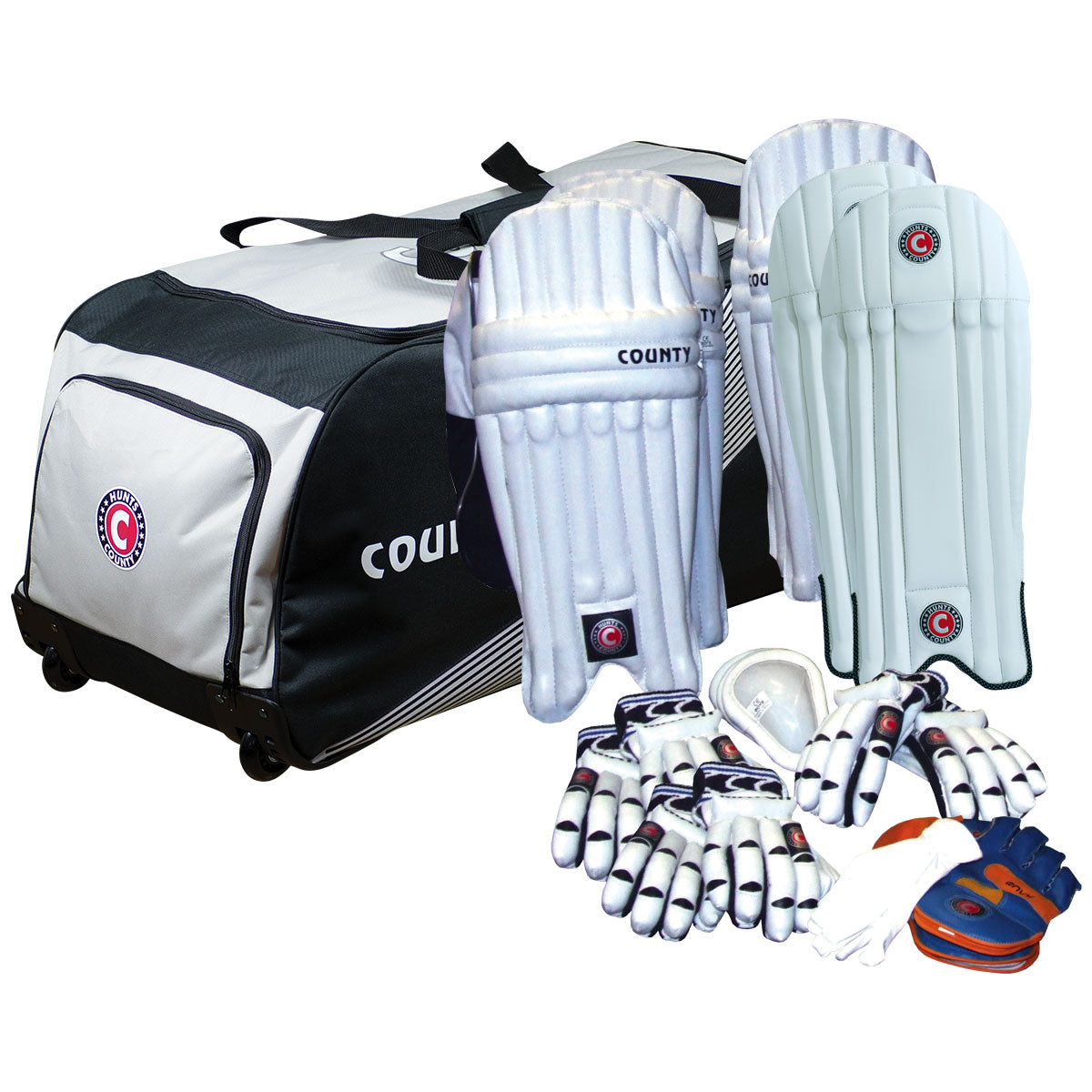 The Hunts County Team Kit Bag (No Bats) by Hunts County includes a black and white duffel bag, two pairs of white batting pads, gloves, an arm guard, thigh guard, and a blue & orange wicket-keeping glove—ideal as a school cricket kit for young players.