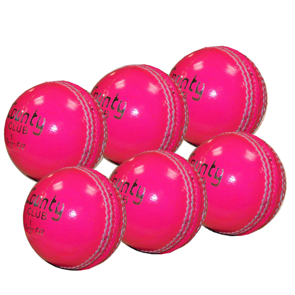 Six Hunts County Club Ball Six Pack training balls in bright pink with white stitching, arranged in two rows on a white background. Each ball features the Hunts County brand printed in black.