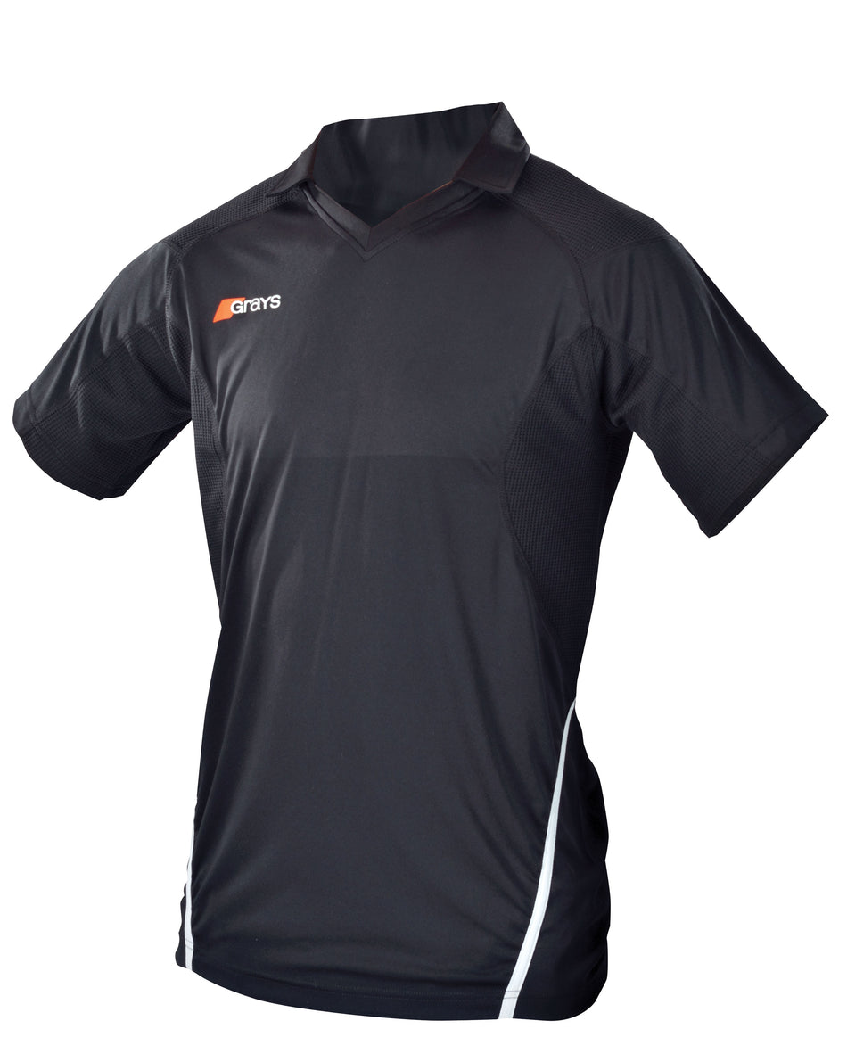 The Grays G750 Junior Shirt in black features short sleeves, white side accents, and a white and orange Grays logo on the chest. Made from lightweight, quick-drying fabric with moisture management and a collar. Brand: Grays.