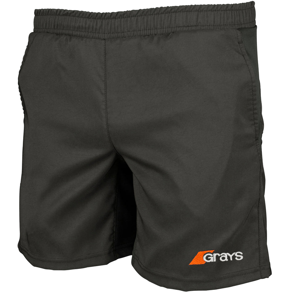 The Grays Junior Axis Hockey Short is a pair of black sports shorts made from lightweight woven fabric, with an elasticated waistband and the Grays logo in white and orange on the left leg.