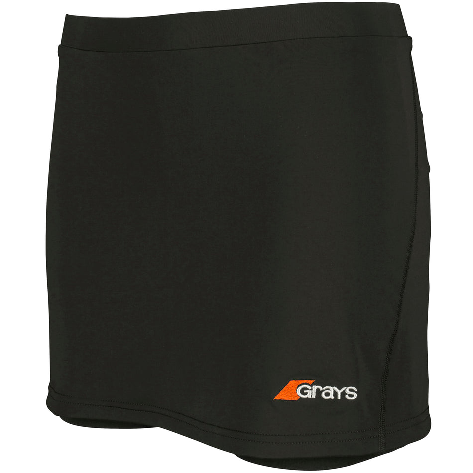 The Grays Apex Hockey Skort is a plain black women's athletic skort with an elastic waistband and a small orange and white Grays logo near the left hem.
