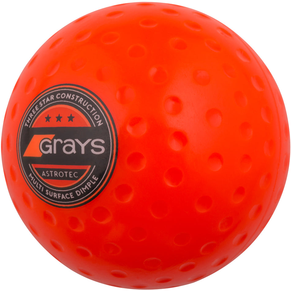 The Grays Astrotec Hockey Ball is a bright orange field hockey ball with the Grays logo, ideal for club match play at county level.
