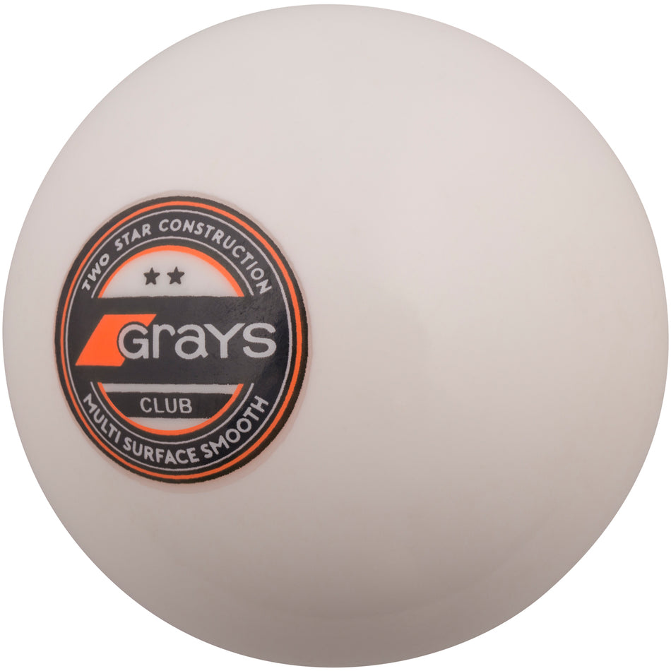The Grays Indoor Hockey Ball is a white PVC ball with a black and orange Grays logo, featuring "TWO STAR CONSTRUCTION" and "MULTI SURFACE SMOOTH" text printed on it.