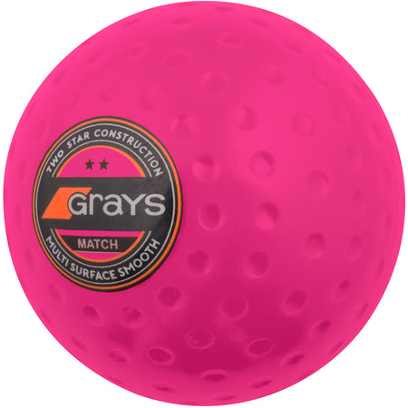 The Grays Match Hockey Balls - Box of 60 features bright pink balls with a dimpled pattern, ideal for club-level performance and consistent play. From trusted brand Grays.