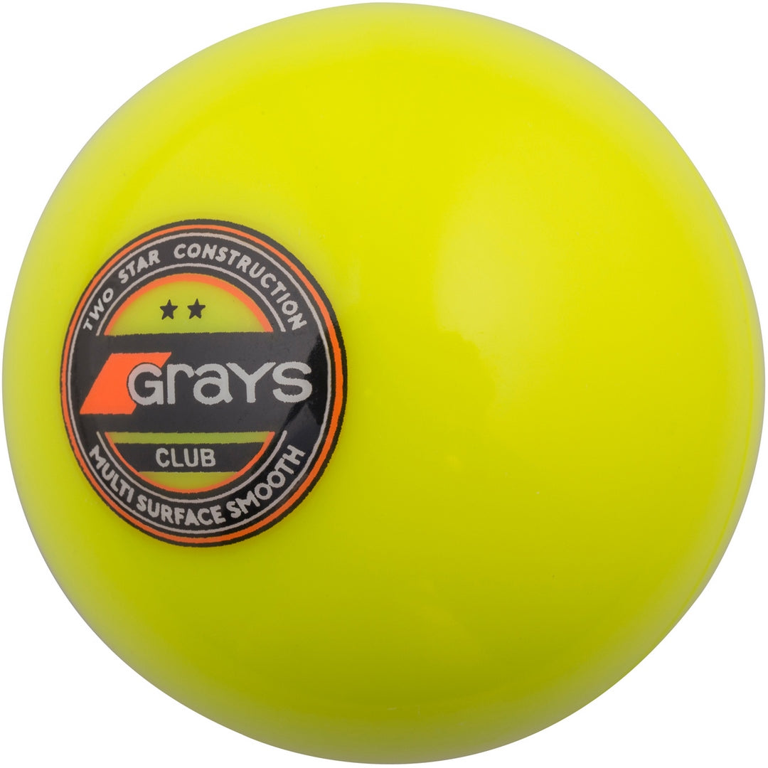 The Grays Club Hockey Ball is a bright yellow training ball featuring the Grays logo, designed for club level play and ideal for synthetic pitches.