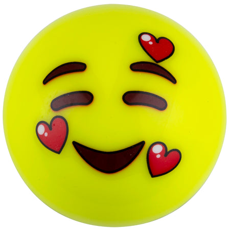 A yellow emoji face with smiling eyes, raised eyebrows, and three red hearts—expressing joy and love, just like the Grays Emoji Hockey Balls (2021) from Martin Berrill Sports.