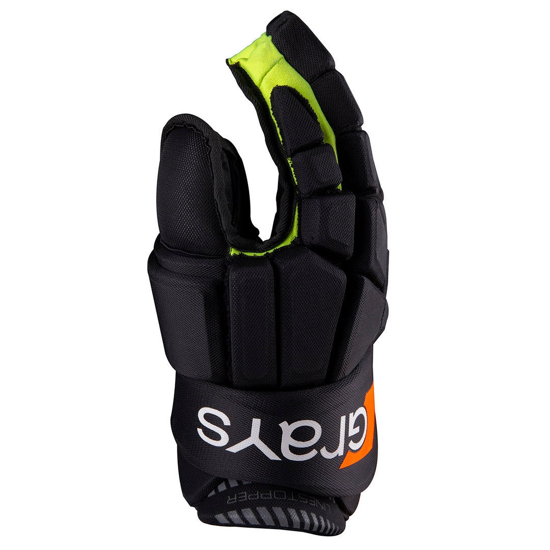 The Grays Linestopper Glove Black/Fluo Yellow is a padded penalty corner defender glove with all-round armour, protective segments, white/orange Grays branding on the wrist strap, and bright yellow-green lining. FIH compliant.