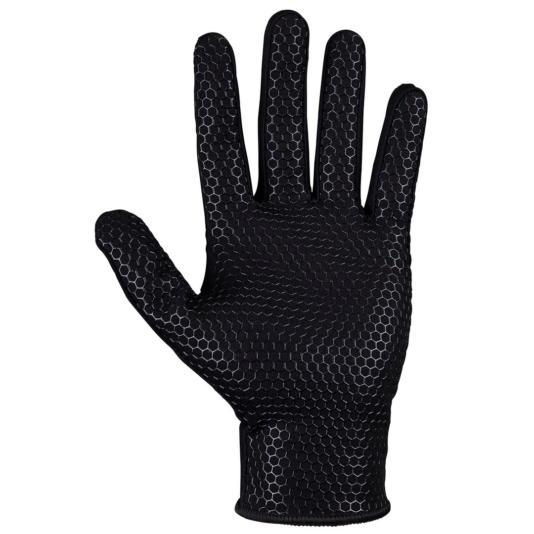 The Grays Skinful Pro Hockey Glove by Grays is shown in black lycra with a textured hexagonal grip pattern, palm facing forward, against a white background.