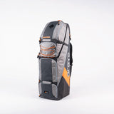 The Grays Alpha-X Kitbag is a large, grey soft-sided hockey bag with orange accents, multiple compartments, a stick pocket, and sturdy handles. "Grays" is printed on the side. The bag stands upright on a white background.