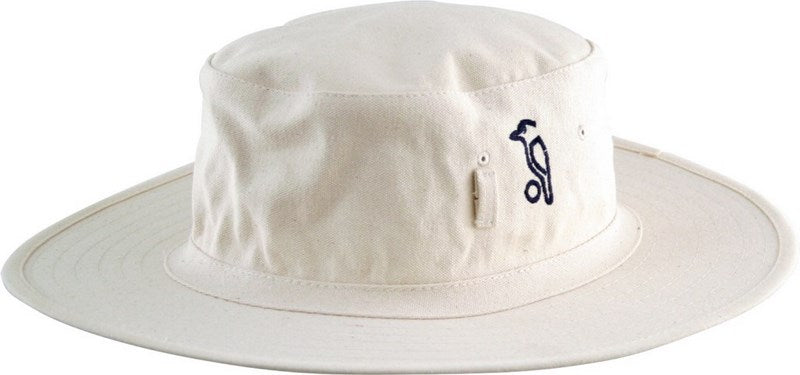 The Kookaburra Sun Hat by Kookaburra is an off-white, wide-brimmed bucket hat with side ventilation eyelets, a small embroidered penguin logo on the front, and comfortable fabric for sun protection.