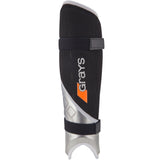 The Grays G700 Pro Shinguards feature a black and white mesh-textured design, a sculpted hard outer shell, two black straps, and "Grays" in white and orange lettering on the front.