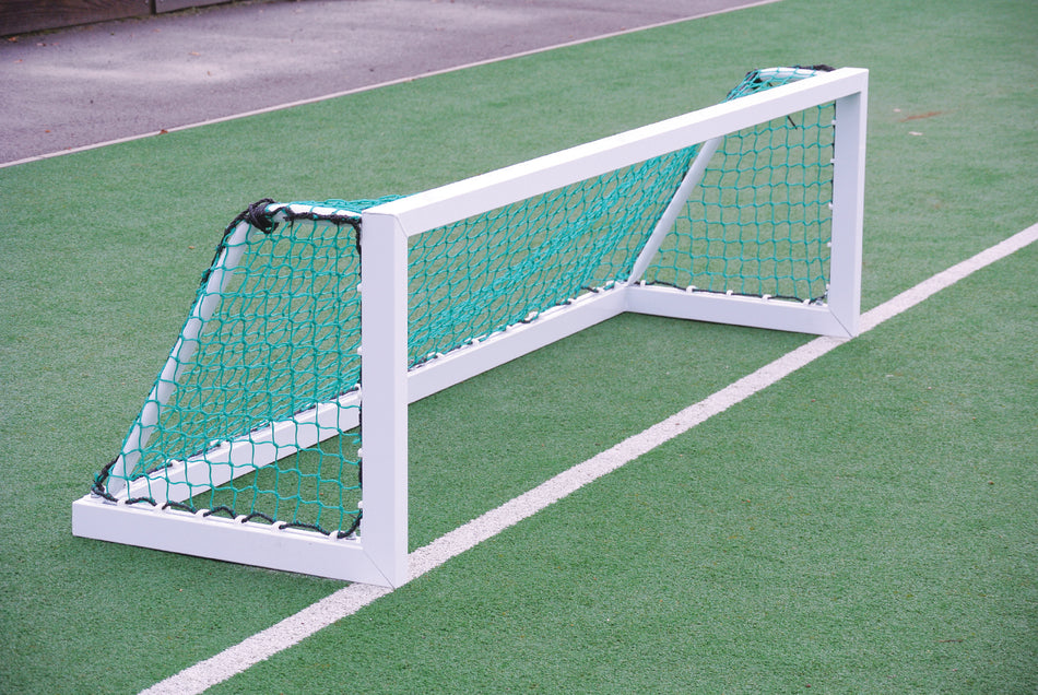 The Harrod Sport Mini Hockey Training Goal (2.44 x 0.6m) features turquoise netting and is ideal for small-sided games or mini training on artificial turf fields.