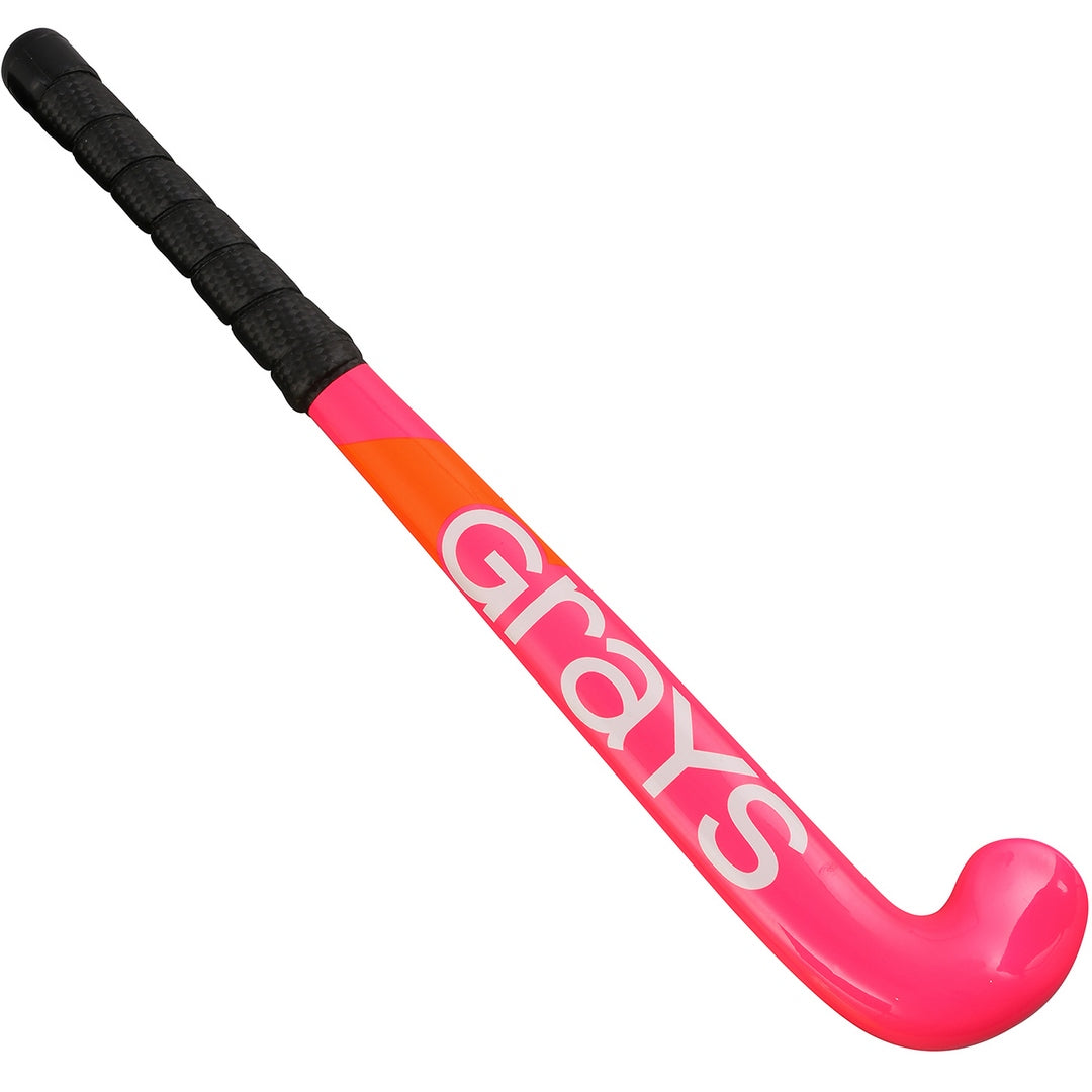 The Grays Replica 18 inch Hockey Stick features a neon pink design, a black grip, and bold white Grays branding, making it both stylish and practical for play.