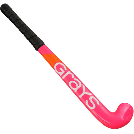 The Grays Replica 18 inch Hockey Stick features a neon pink design, a black grip, and bold white Grays branding, making it both stylish and practical for play.