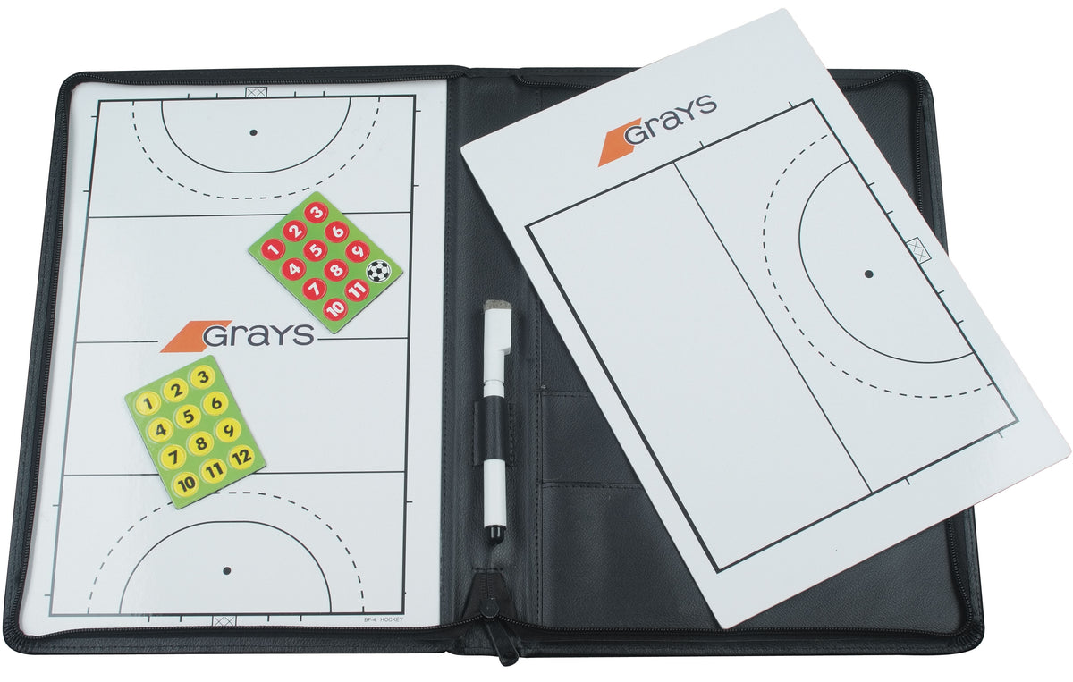 The Grays Coaching Folder by Grays features a tactical board with pitch markings, a marker, and numbered magnetic counters—perfect for strategy planning. This black folder keeps all your field hockey essentials organized and accessible.