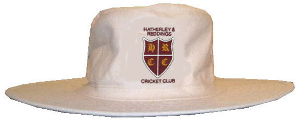 The Hatherley & Reddings CC Sun Hat by Martin Berrill Sports is a beige wide-brim cricket hat featuring the club logo with a maroon and gold shield and text above and below the emblem.