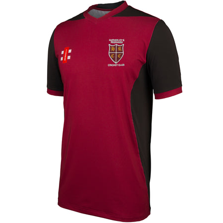 The Gray Nicolls Hatherley & Reddings CC T20 Short Sleeve Shirt features maroon and black colors, a club crest, "Hatherley & Reddings Cricket Club" across the chest, and white/red logos. Designed for comfort and moisture control during play.