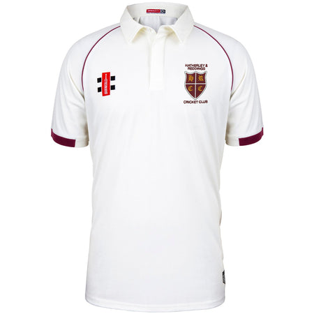 A white Hatherley & Reddings CC Matrix V2 Short Sleeve Match Shirt by Martin Berrill Sports, featuring maroon trim, moisture-wicking fabric, embroidered logos, and the club crest on the chest.